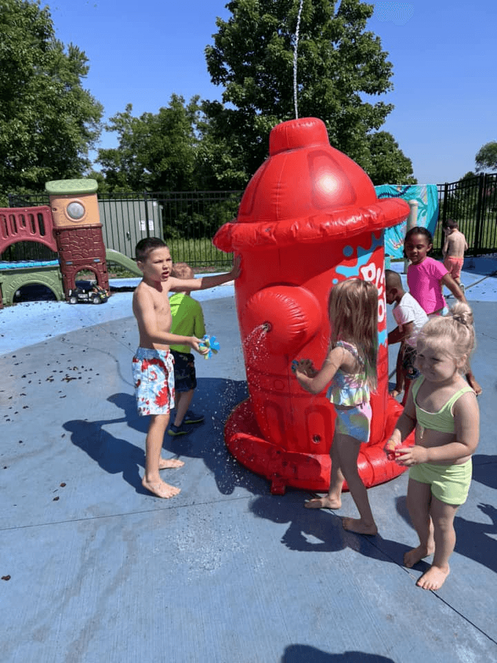 Children at the splash pad fire hydrant