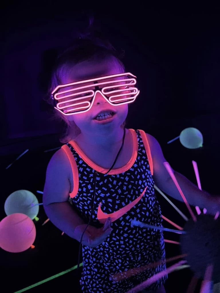 Child enjoying glow night